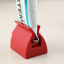 Load image into Gallery viewer, Rolling Toothpaste Tube Dispenser