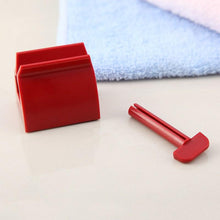 Load image into Gallery viewer, Rolling Toothpaste Tube Dispenser