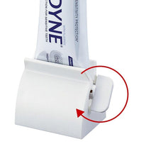 Load image into Gallery viewer, Rolling Toothpaste Tube Dispenser