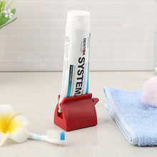 Load image into Gallery viewer, Rolling Toothpaste Tube Dispenser