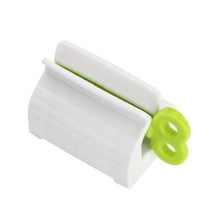 Load image into Gallery viewer, Rolling Toothpaste Tube Dispenser